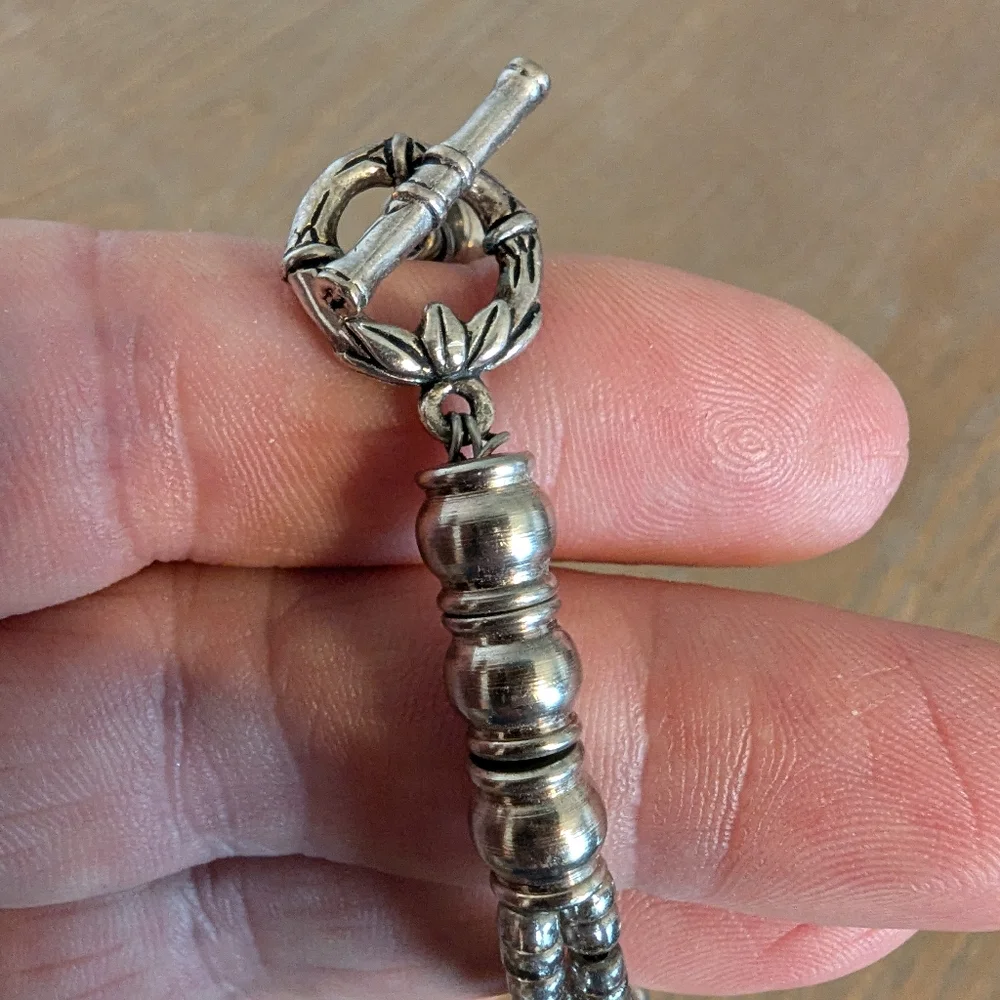 Source Unknown elegant silver